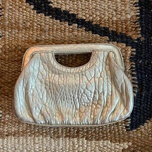 Linea Pelle gold leather clutch ⚡️